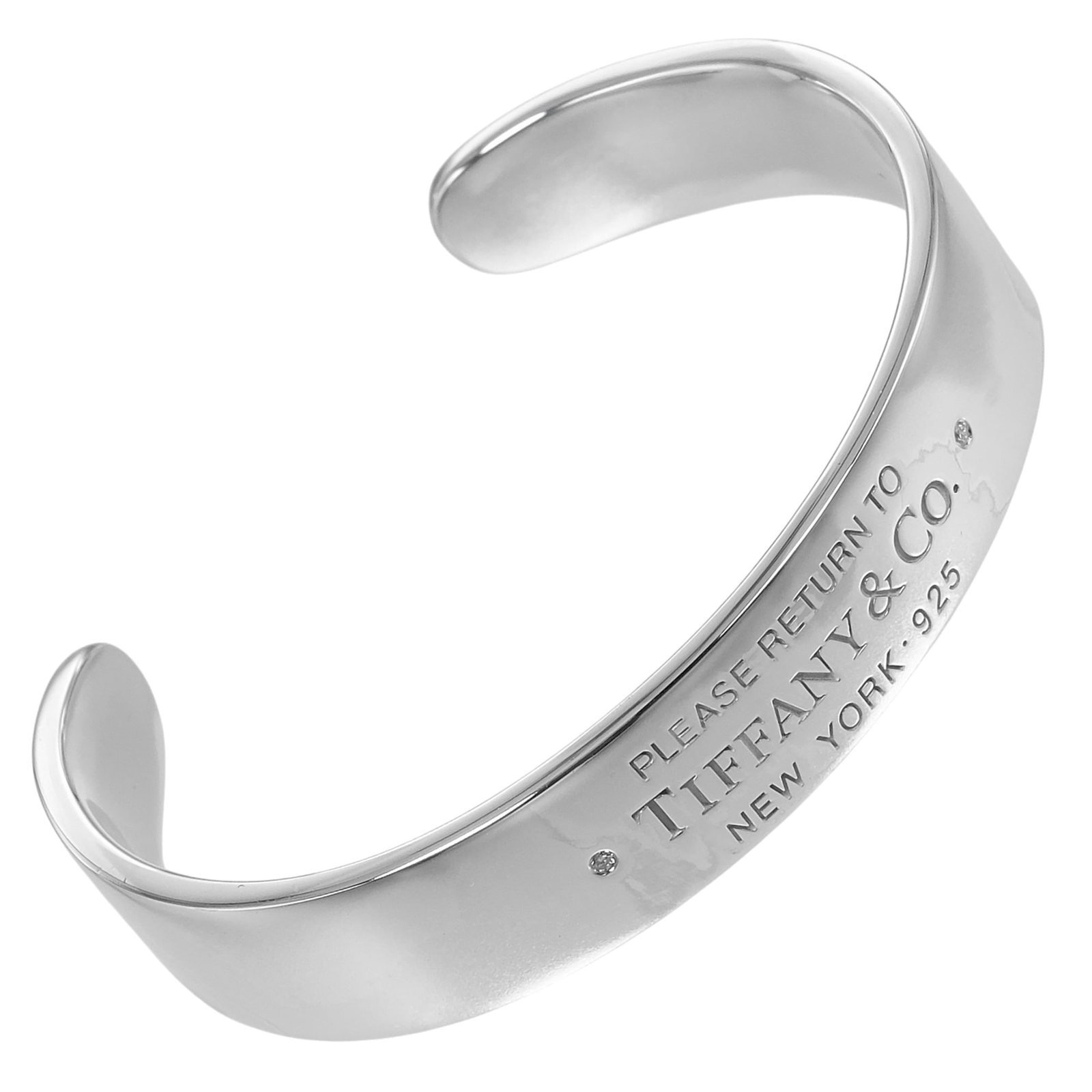 Tiffany Bangle Silver 925: Tiffany Bangle Silver 925 Silver bangle from Tiffany, made from sterling silver (925), with a length of 15cm. This simple yet elegant piece features a classic design that suits women's wrists. The ban