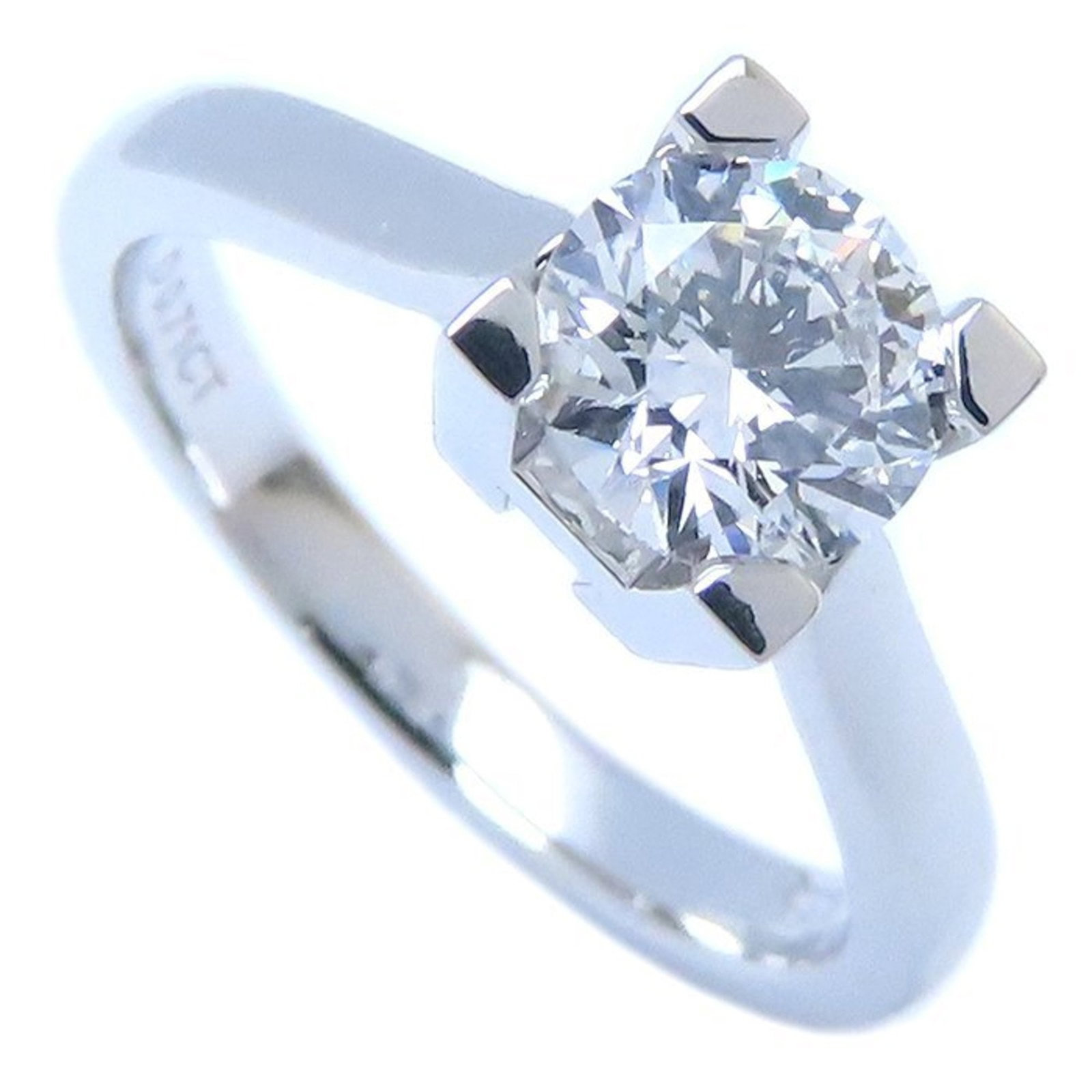 Ring by Harry Winston: Ring by Harry Winston Platinum band ring by Harry Winston, featuring a 0.71ct VVS2 diamond and weighing 5.4g, comes with its original box, certificate, and diamond grading report. This elegant piece i