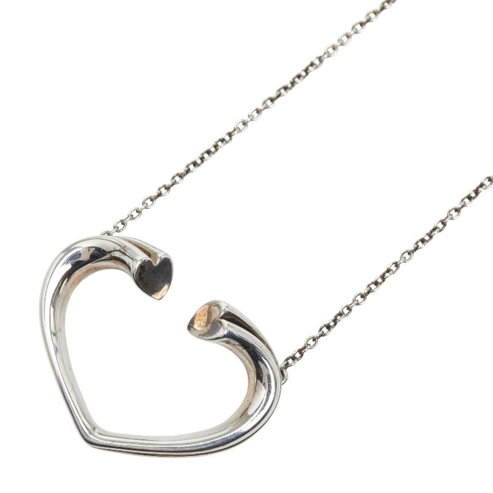 Tiffany heart tenderness necklace for women in sterling silver: Tiffany heart tenderness necklace for women in sterling silver Sterling silver Tiffany heart tenderness necklace for women, featuring a pendant with dimensions of 18.1mm x 23.8mm and a neck