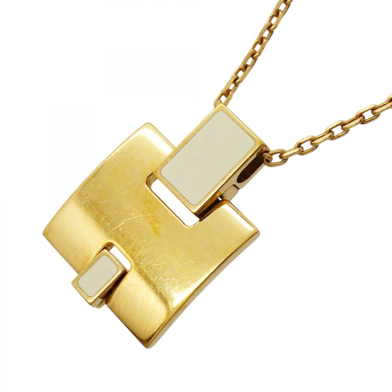 Hermes Eileen Necklace Gp Plated Gold Ivory Women'S Op003492: Hermes Eileen Necklace Gp Plated Gold Ivory Women'S Op003492 Gold plating on an ivory pendant, suspended from a gold plated chain, this Eileen necklace by Hermes features a timeless design that adds e