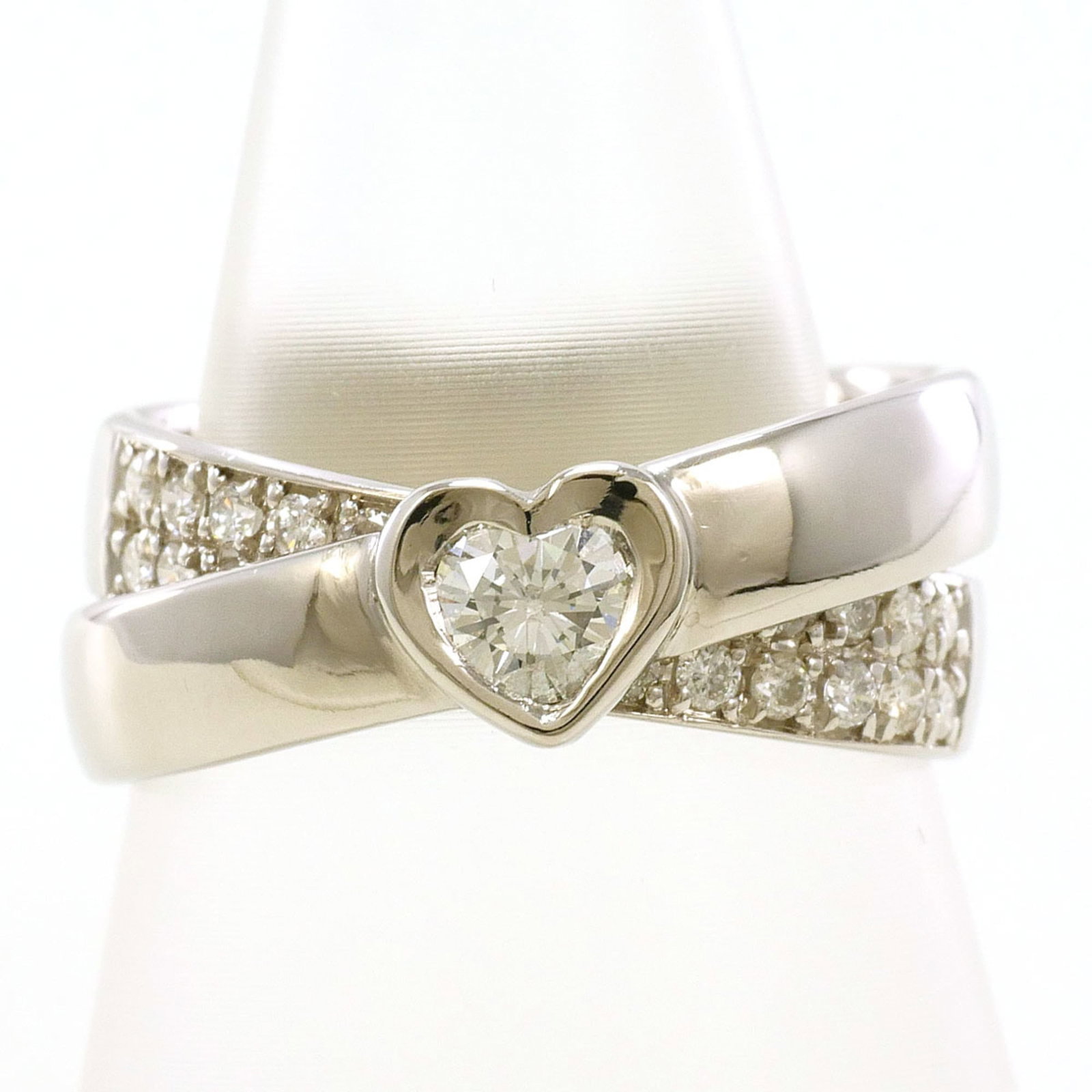 Unbranded Band Ring Platinum 900: Unbranded Band Ring Platinum 900 Platinum 900 band ring features a diamond stone set in an unbranded platinum metal construction, available in US size 4.5 and a width of 8mm. The ring's weight is 7.8g