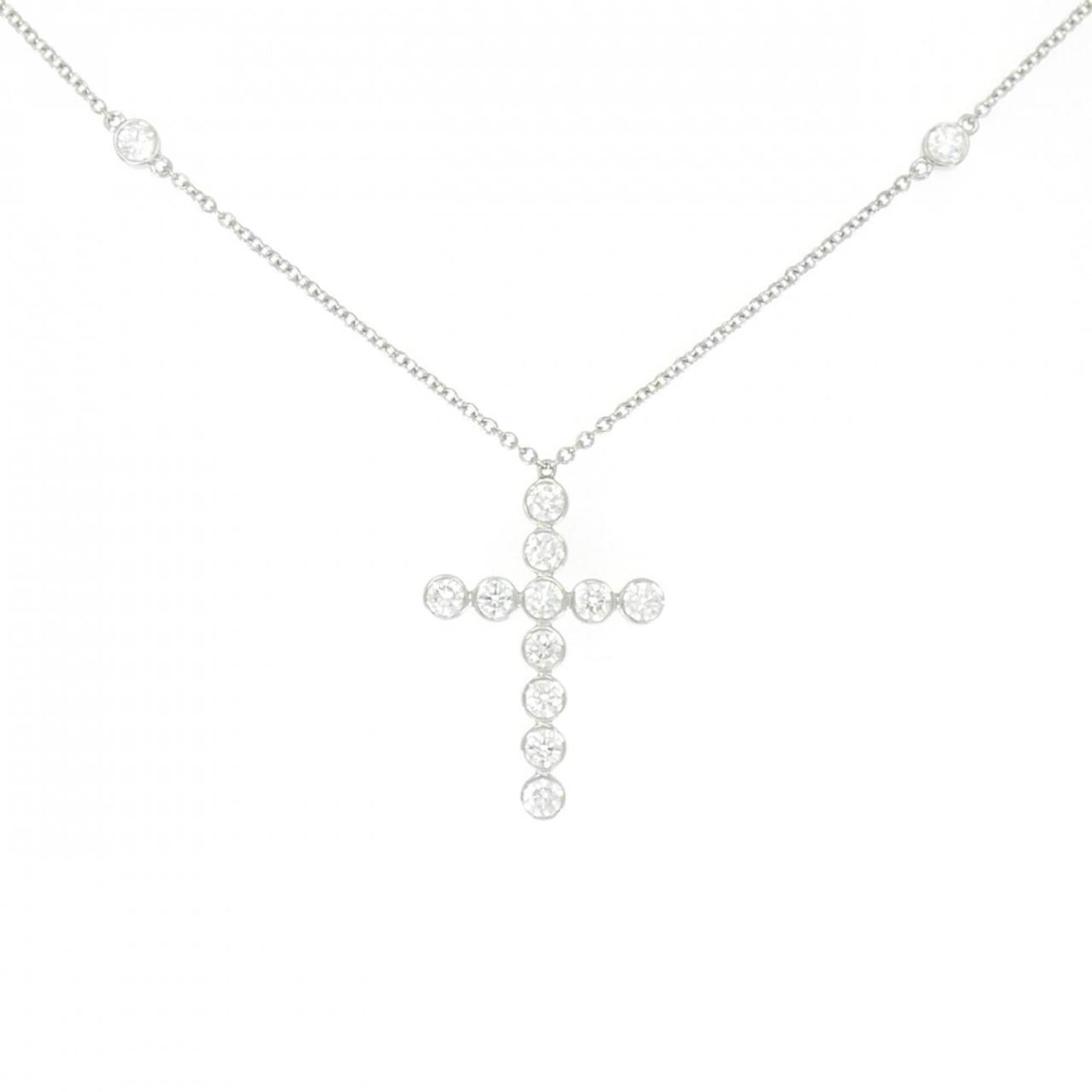 Tiffany Cross Bezel Necklace: Tiffany Cross Bezel Necklace Tiffany Cross Bezel Necklace features a stunning diamond pendant set in platinum, with a sleek bezel design and precise measurements. The necklace boasts a striking 5g dia