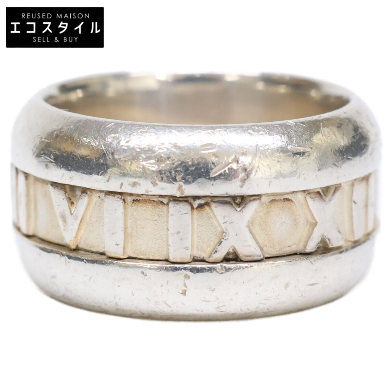 Silver band ring Tiffany 925: Silver band ring Tiffany 925 Silver band ring Tiffany 925 features a sleek, silver design with a US size 4 fit. Made from high-quality sterling silver (925), this band ring offers a touch of understat