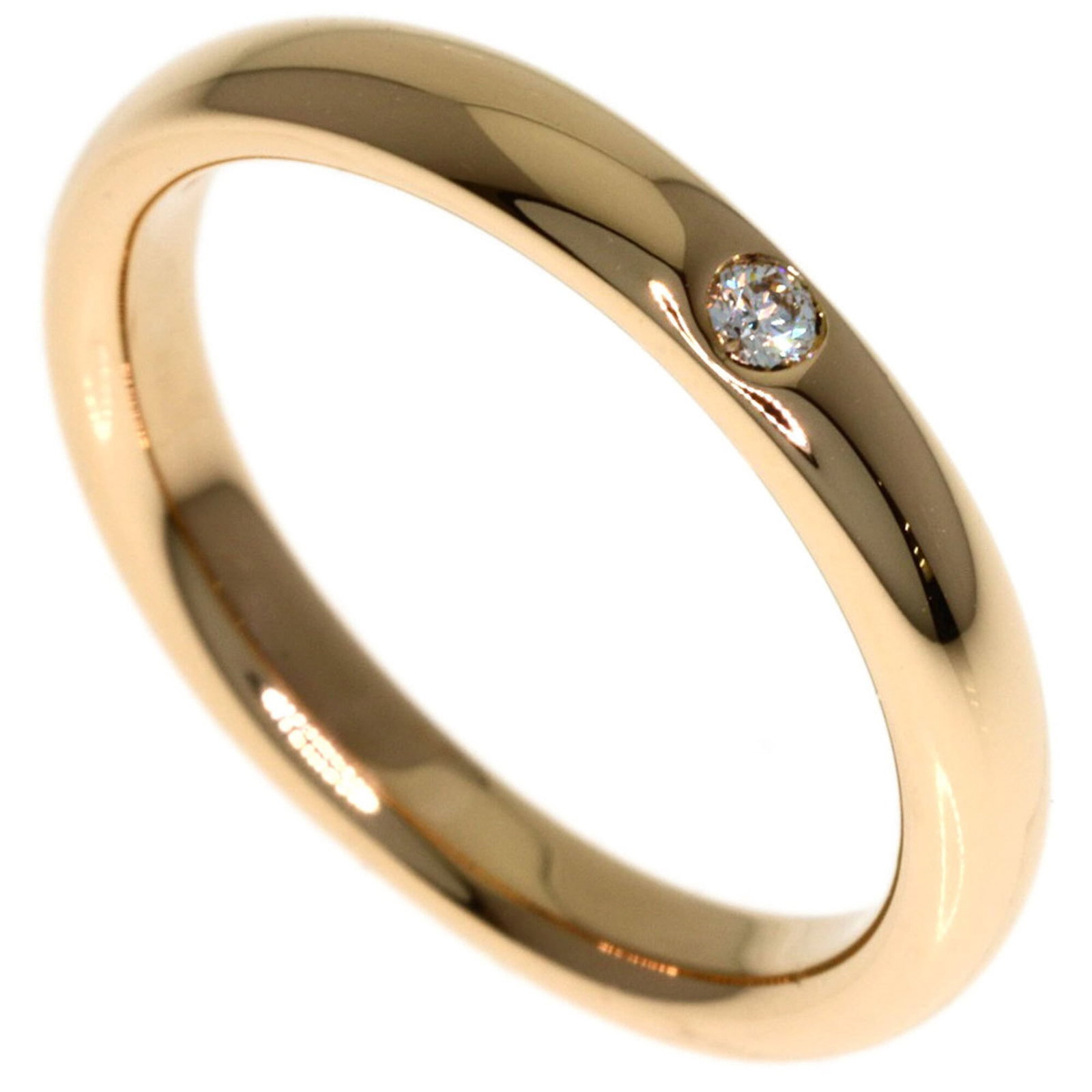 Pink Gold Tiffany Ring Band: Pink Gold Tiffany Ring Band Pink gold Tiffany ring band, crafted from 18K material, boasts a distinctive pink hue. This women's band features a sleek design with a US size of 3.5. The piece bears a si