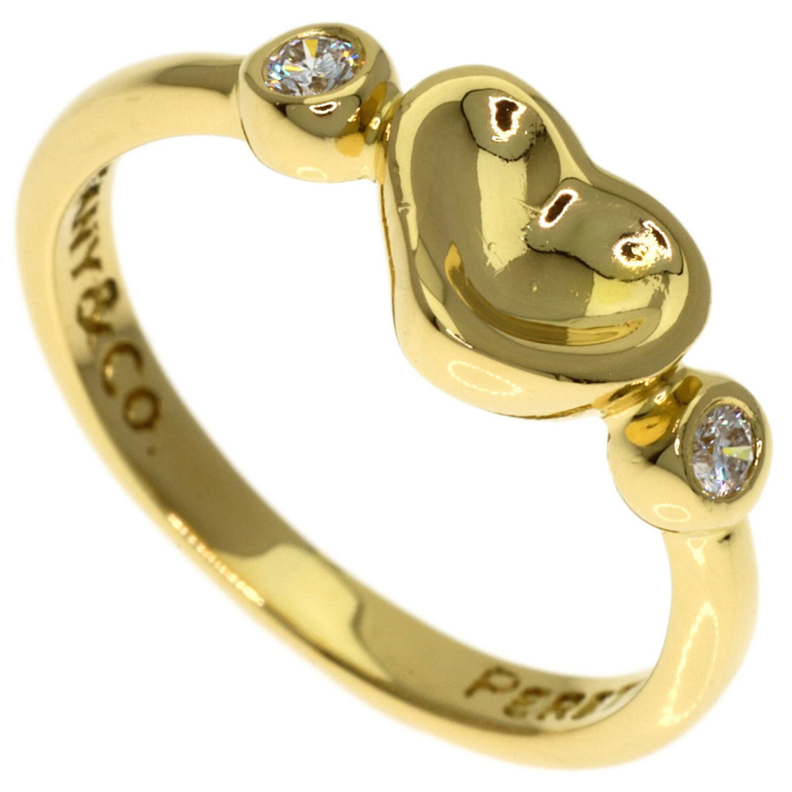 Yellow Gold 18K Tiffany Band Ring: Yellow Gold 18K Tiffany Band Ring Yellow gold 18K Tiffany band ring, featuring a diamond stone and available in US size 3. This elegant ring showcases the classic style of Tiffany & Co., with its yell