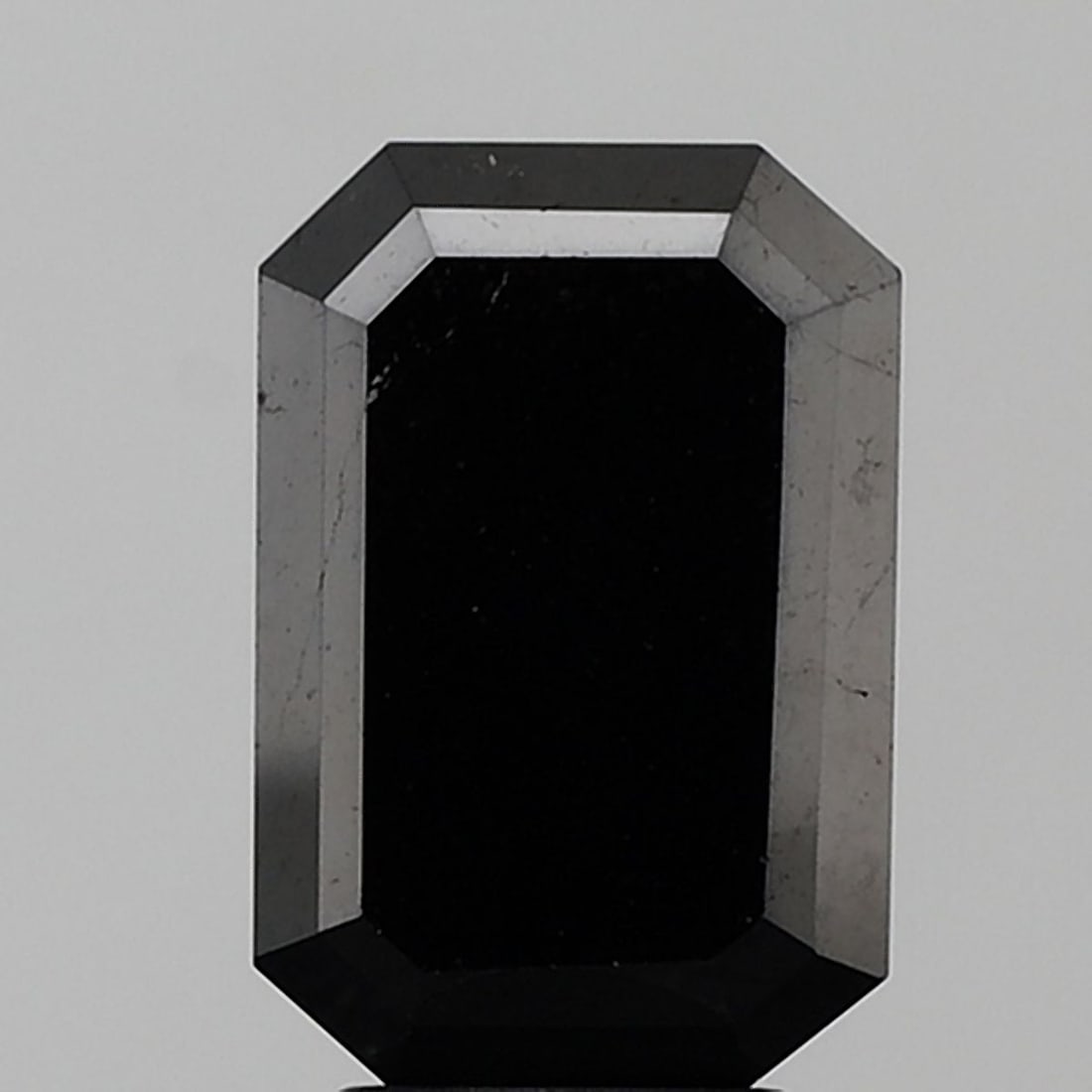 Emerald 4.29ct Black VVS2 - Loose Natural Diamond: Emerald 4.29ct Black VVS2 - Loose Natural Diamond 4.29ct Black VVS2 - Loose Natural Diamond with EX Cut, EX Polish, and Symmetry. This stunning emerald-cut diamond boasts a rare black color and except