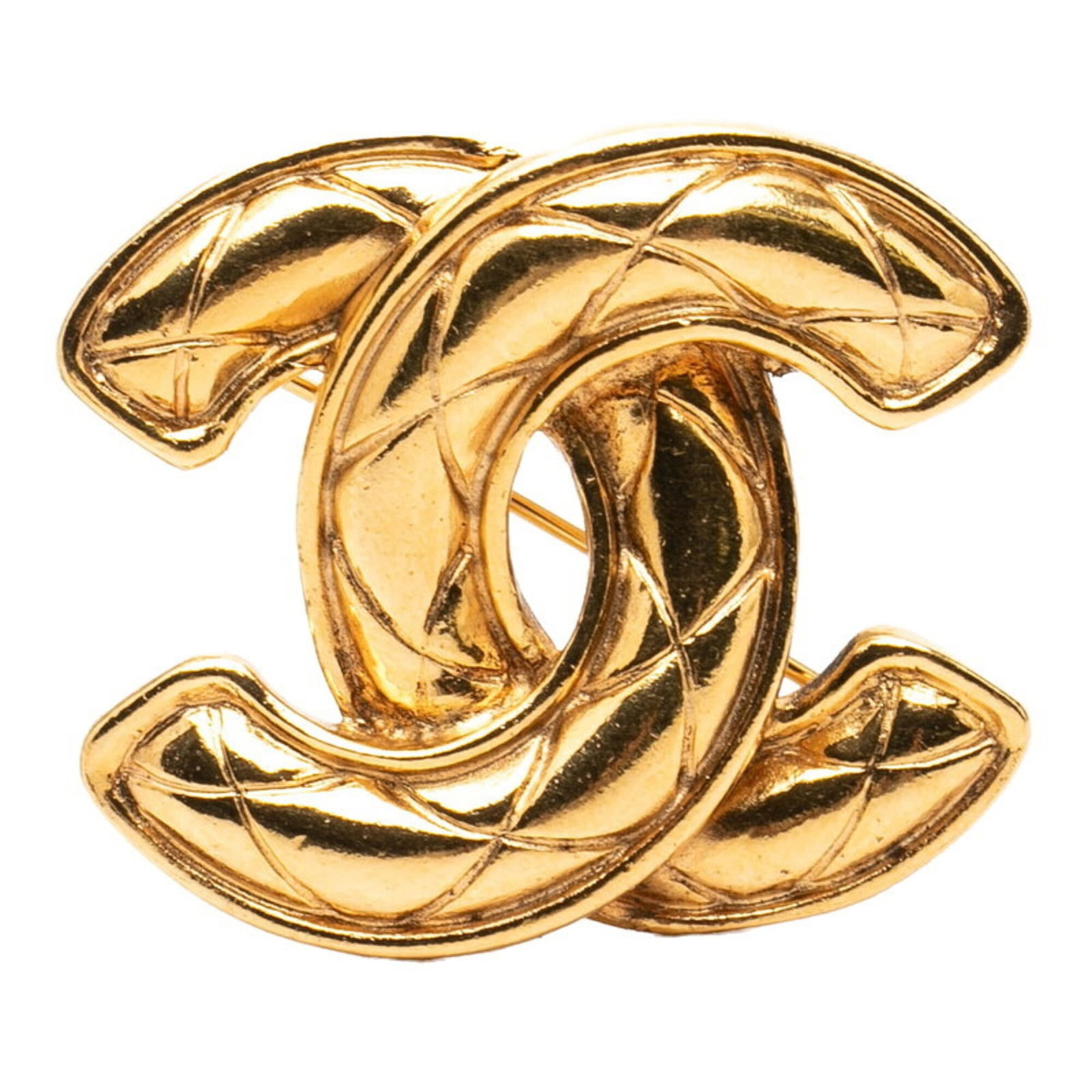 Chanel Brooch Gold Plating: Chanel Brooch Gold Plating Gold plating on the Chanel brooch adds a touch of luxury to any outfit. The intricate design and gold finish make it a stylish accessory for women's fashion. Measuring 3.36c