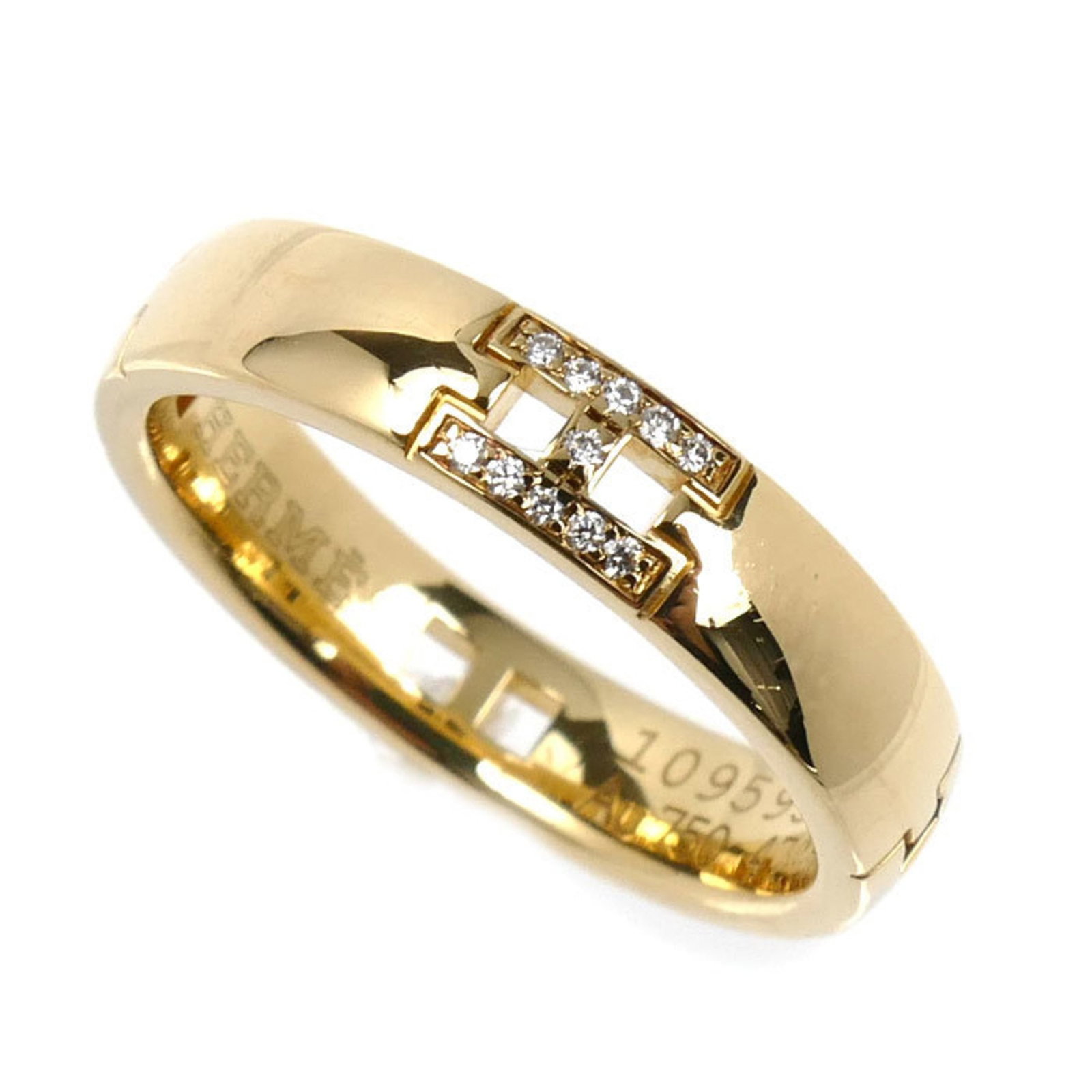 Hermes Band Ring Yellow Gold (18K): Hermes Band Ring Yellow Gold (18K) Yellow gold (18K) band ring from Hermes, featuring a diamond stone and made in France. This women's ring boasts a classic design with a 47 US size and brand size 4. 