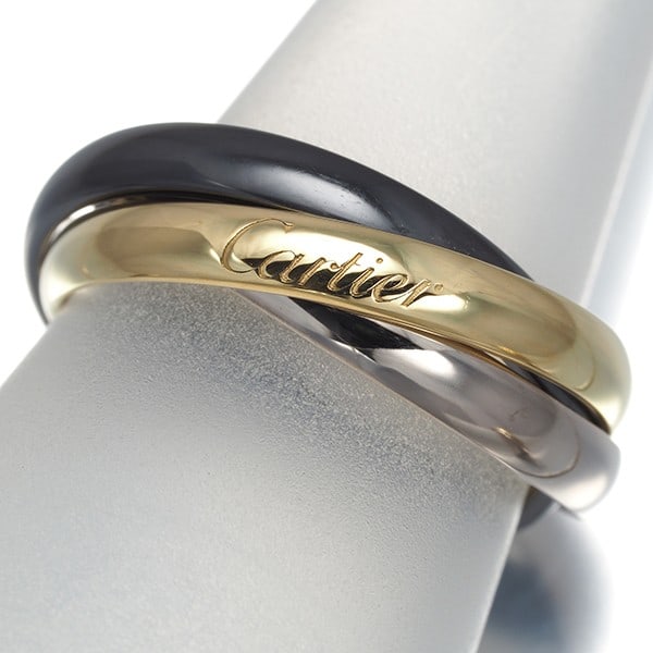 Cartier Ring Trinity Sm Eu54 18K 750 Yellow White Gold/ Ceramic: Cartier Ring Trinity Sm Eu54 18K 750 Yellow White Gold/ Ceramic Cartier's Trinity ring boasts a unique multi-tone gold design, featuring both yellow and white gold in one piece. This elegant ring show