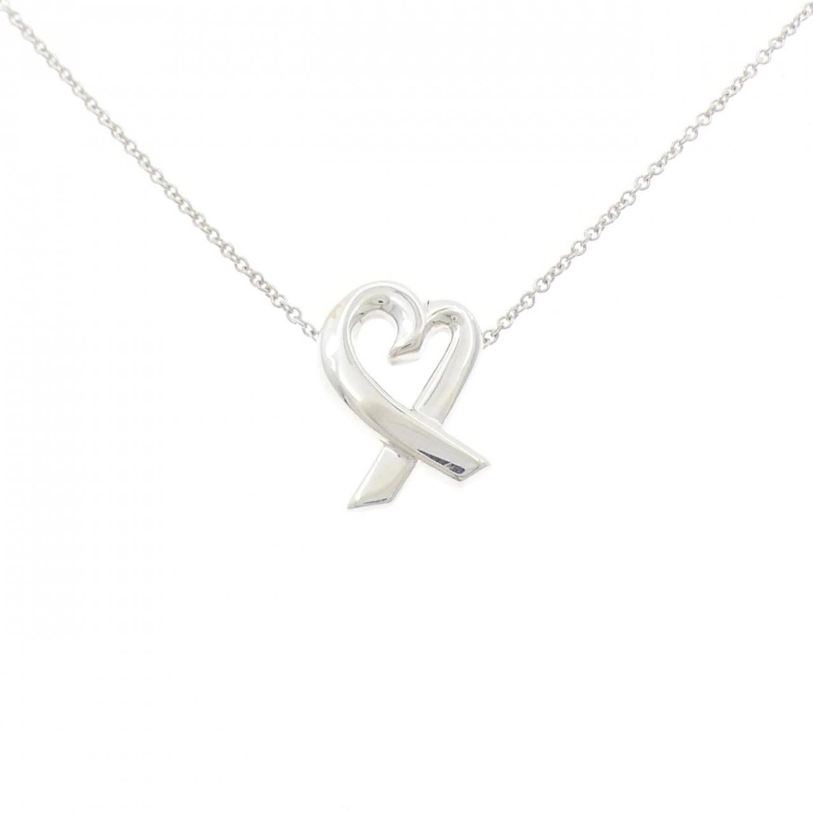 Loving Small Heart Necklace by Tiffany: Loving Small Heart Necklace by Tiffany Silver Loving Small Heart Necklace by Tiffany, featuring a delicate pendant with a 15.5mm x 11mm size and a silver 925 material, is available for purchase. This 