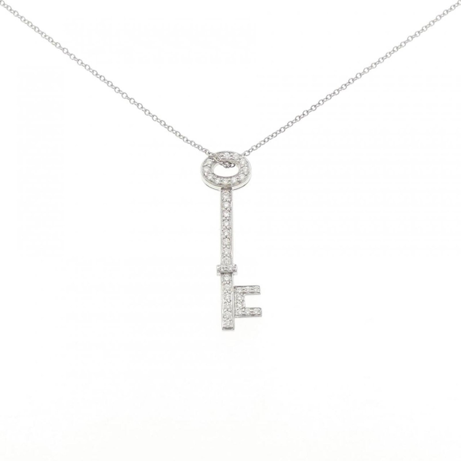 Diamond Necklace by Tiffany: Diamond Necklace by Tiffany Platinum diamond necklace by Tiffany, featuring a stunning pendant with a 30.4mm x 8.6mm diamond stone set against a platinum background, suspended from a 44 cm / 17.32''