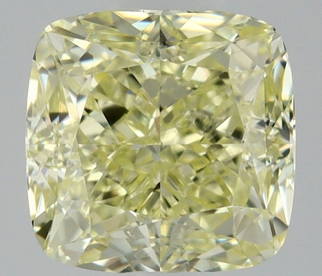 GIA Cushion Modified 0.57ct Fancy Light Yellow VVS2 - Loose Natural Diamond: GIA Cushion Modified 0.57ct Fancy Light Yellow VVS2 - Loose Natural Diamond 0.57ct Fancy Light Yellow VVS2 - Loose Natural Diamond, certified by the Gemological Institute of America (GIA), boasts exce