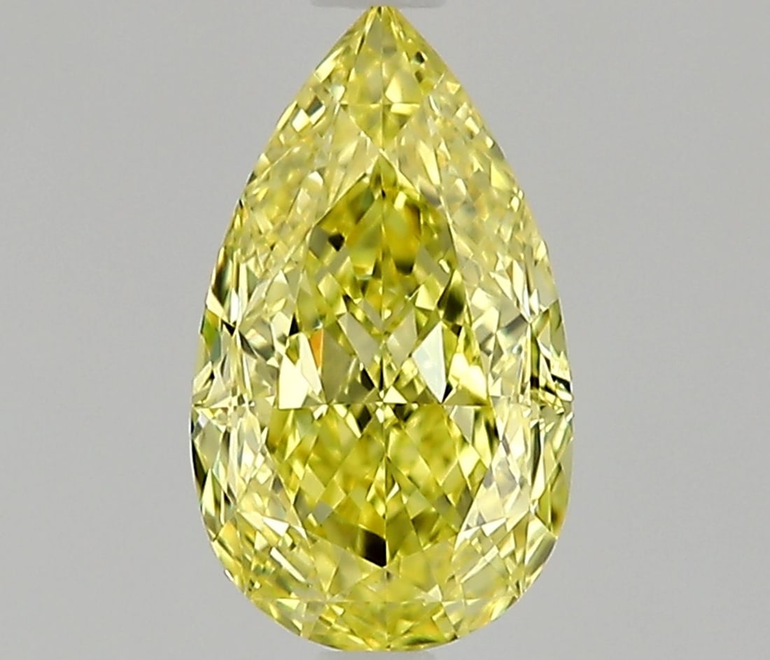 GIA Pear 0.7ct Fancy Intense Yellow VVS1 - Loose Natural Diamond: GIA Pear 0.7ct Fancy Intense Yellow VVS1 - Loose Natural Diamond GIA-certified Fancy Intense Yellow VVS1 diamond, boasting EX polish and symmetry. This 0.7ct natural loose diamond features a vibrant, 