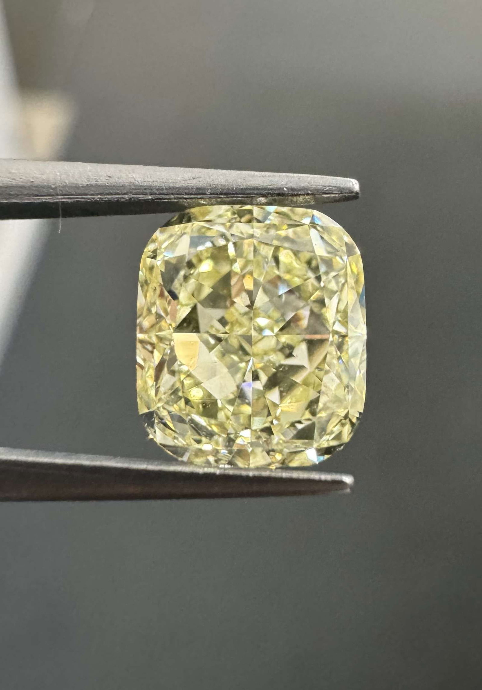 GIA Cushion Brilliant 1.51ct Fancy Light Yellow VVS2 - Loose Natural Diamond: GIA Cushion Brilliant 1.51ct Fancy Light Yellow VVS2 - Loose Natural Diamond GIA certified, this loose natural diamond boasts an impressive 1.51 carat Fancy Light Yellow VVS2 cut, showcasing exception