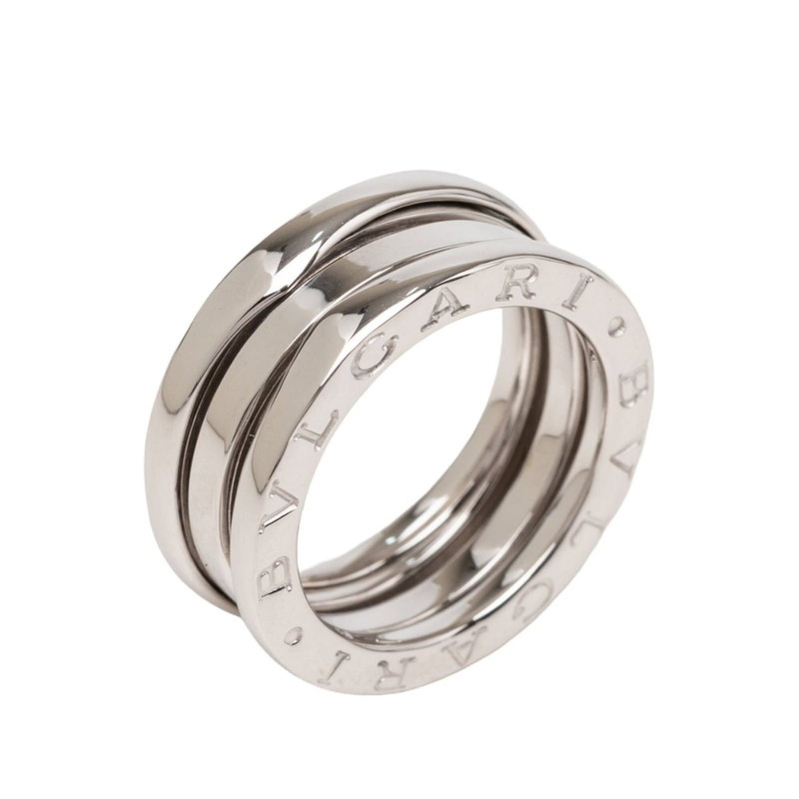 White Gold Bvlgari Ring Band: White Gold Bvlgari Ring Band White gold Bvlgari ring band, crafted from 18K material, boasts a sleek 7.5mm width and inner diameter of 15.50mm. This elegant band features the iconic B.zero1 design, ma