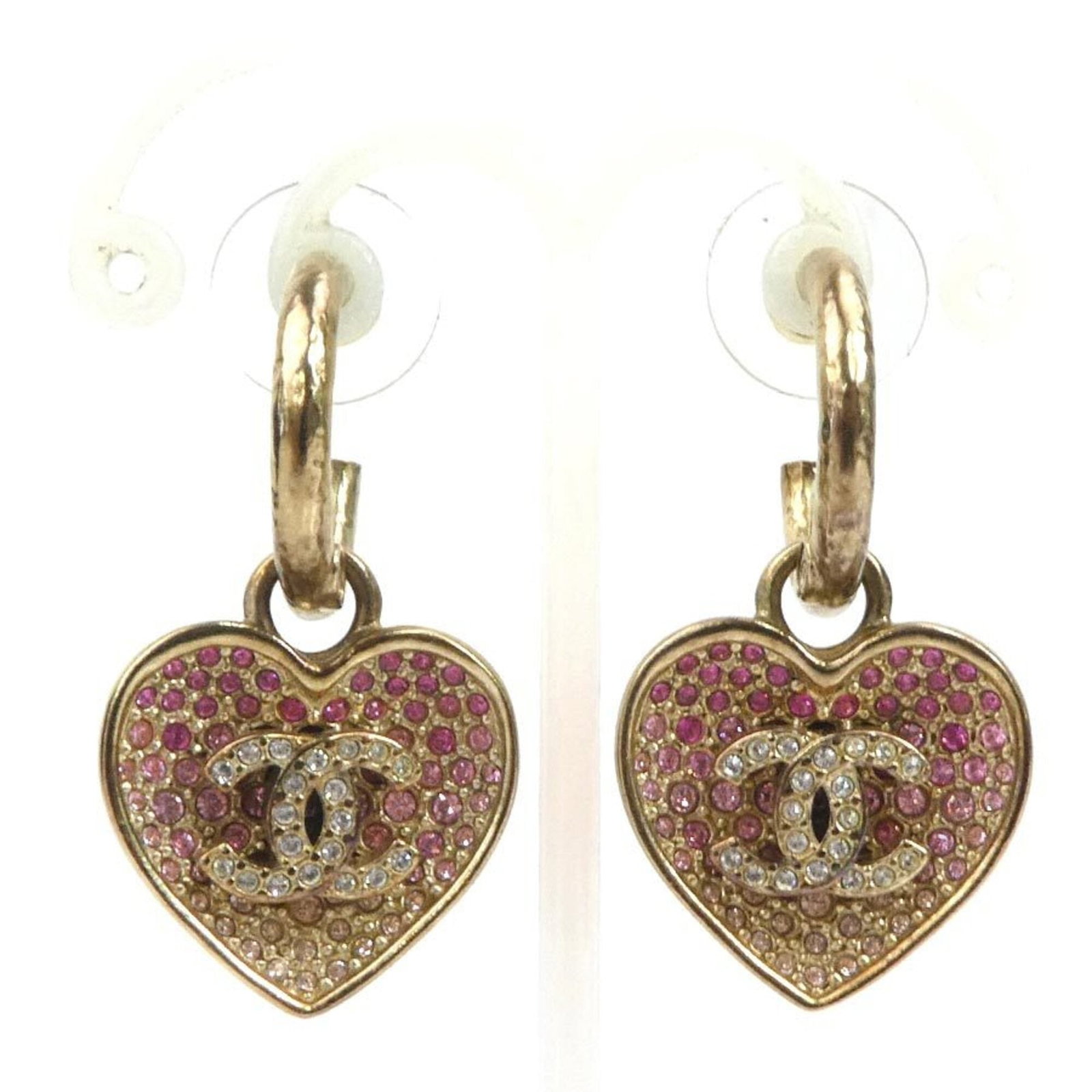 Chanel Drop Earrings Metal Rhinestone: Chanel Drop Earrings Metal Rhinestone Chanel's iconic Drop Earrings shine with gold and pink rhinestones, adding a touch of luxury to any outfit. The metal construction provides a sturdy base for the 