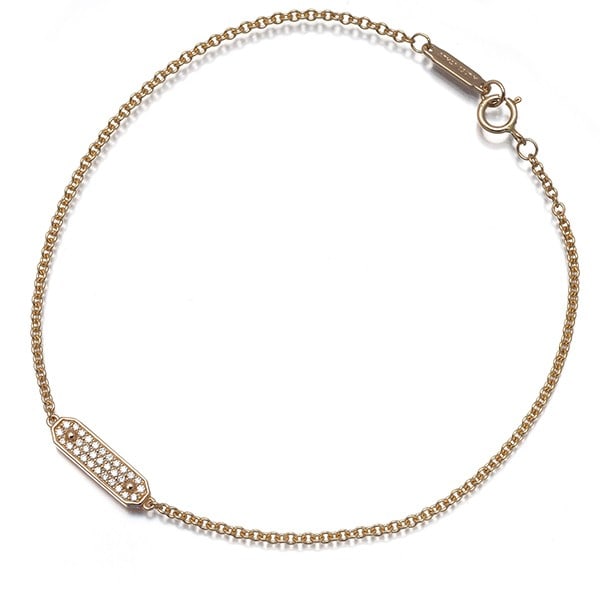 Tiffany Co. Rose Gold Diamond 18K Chain Tag Bracelet: Tiffany Co. Rose Gold Diamond 18K Chain Tag Bracelet Tiffany & Co.'s Rose Gold Diamond Chain Tag Bracelet boasts a stunning 18k rose gold chain adorned with a natural diamond, showcasing the luxury an