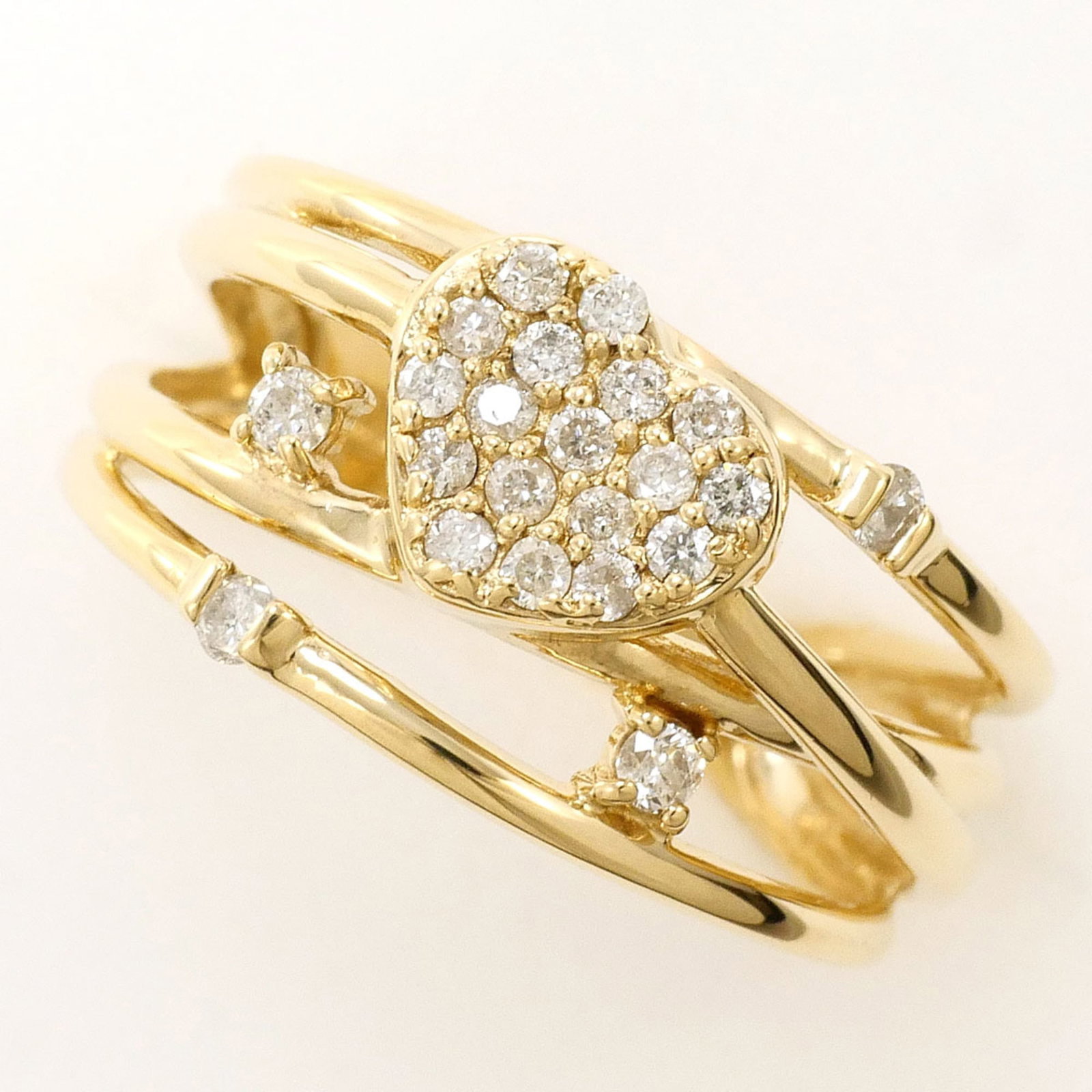 Unbranded Band Ring Yellow Gold (10K): Unbranded Band Ring Yellow Gold (10K) Yellow gold band ring with a 0.20ct diamond, measuring 9mm in width and weighing 2.3g, crafted from 10K metal. This elegant piece features a classic design that c