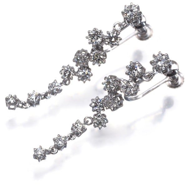 Diamond 0.50Ct/ 0.50Ct Drop Earrings 14K 585 White Gold: Diamond 0.50Ct/ 0.50Ct Drop Earrings 14K 585 White Gold 14K white gold drop earrings feature two natural diamonds totaling 0.50ct each, set in a sleek design with a clip-on or screw-back closure for s