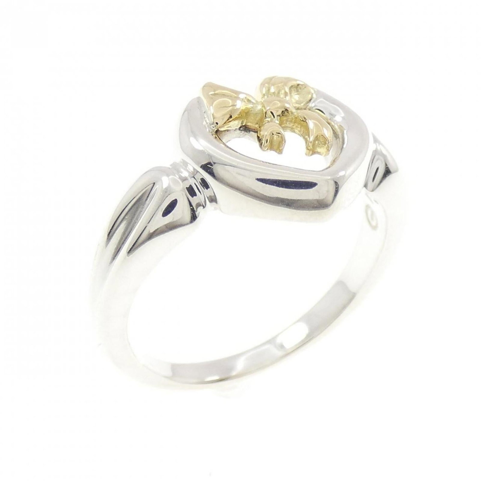 Tiffany Band Ring Silver 925 Yellow Gold (18K): Tiffany Band Ring Silver 925 Yellow Gold (18K) Silver and yellow gold band ring from Tiffany, crafted with 925 silver and 18K yellow gold. This classic design features a timeless combination of metals