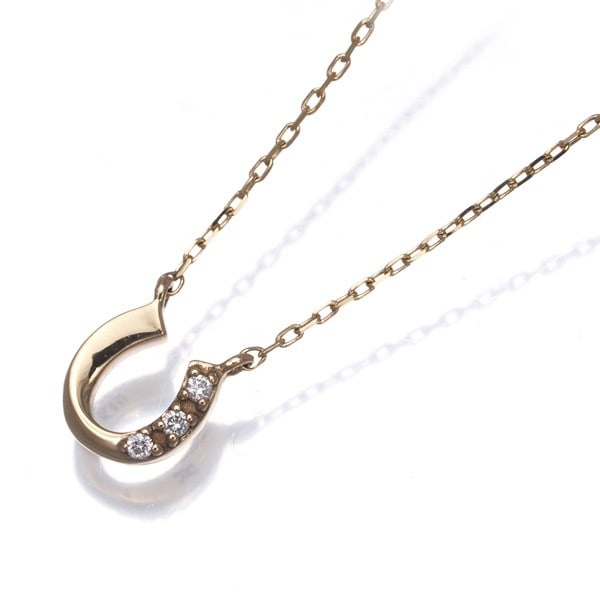 Diamond necklace horseshoe gold yellow 10k Vendome: Diamond necklace horseshoe gold yellow 10k Vendome Yellow gold 10k Vendome diamond necklace features a pendant with a natural diamond, weighing approximately 0.7g, suspended from a 37-40cm long chain.