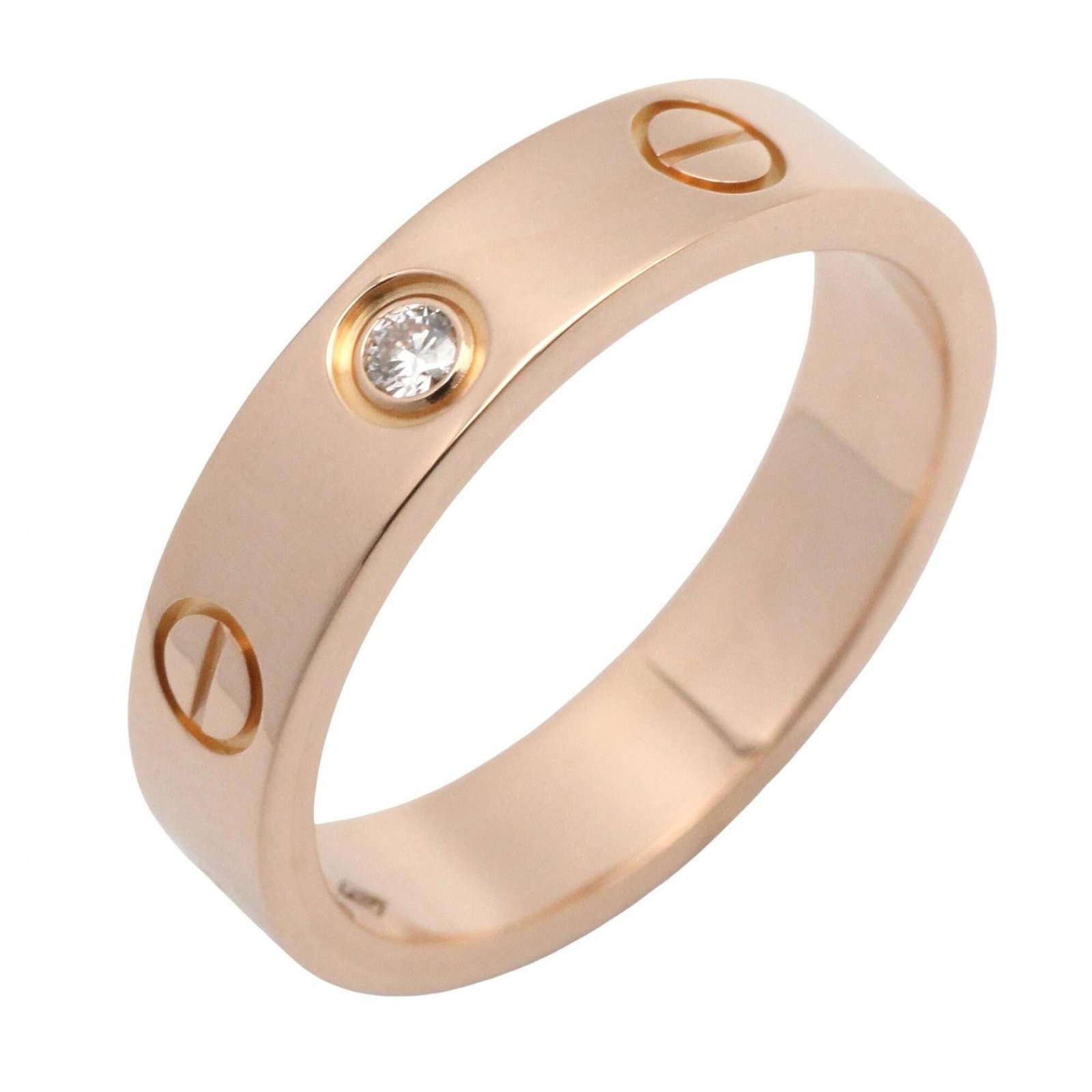 Pink Gold Cartier Band Ring 18K: Pink Gold Cartier Band Ring 18K Pink gold Cartier band ring in 18K, featuring a clear diamond and US size 4.5. This elegant ring showcases the luxury brand's signature style with its pink gold materia