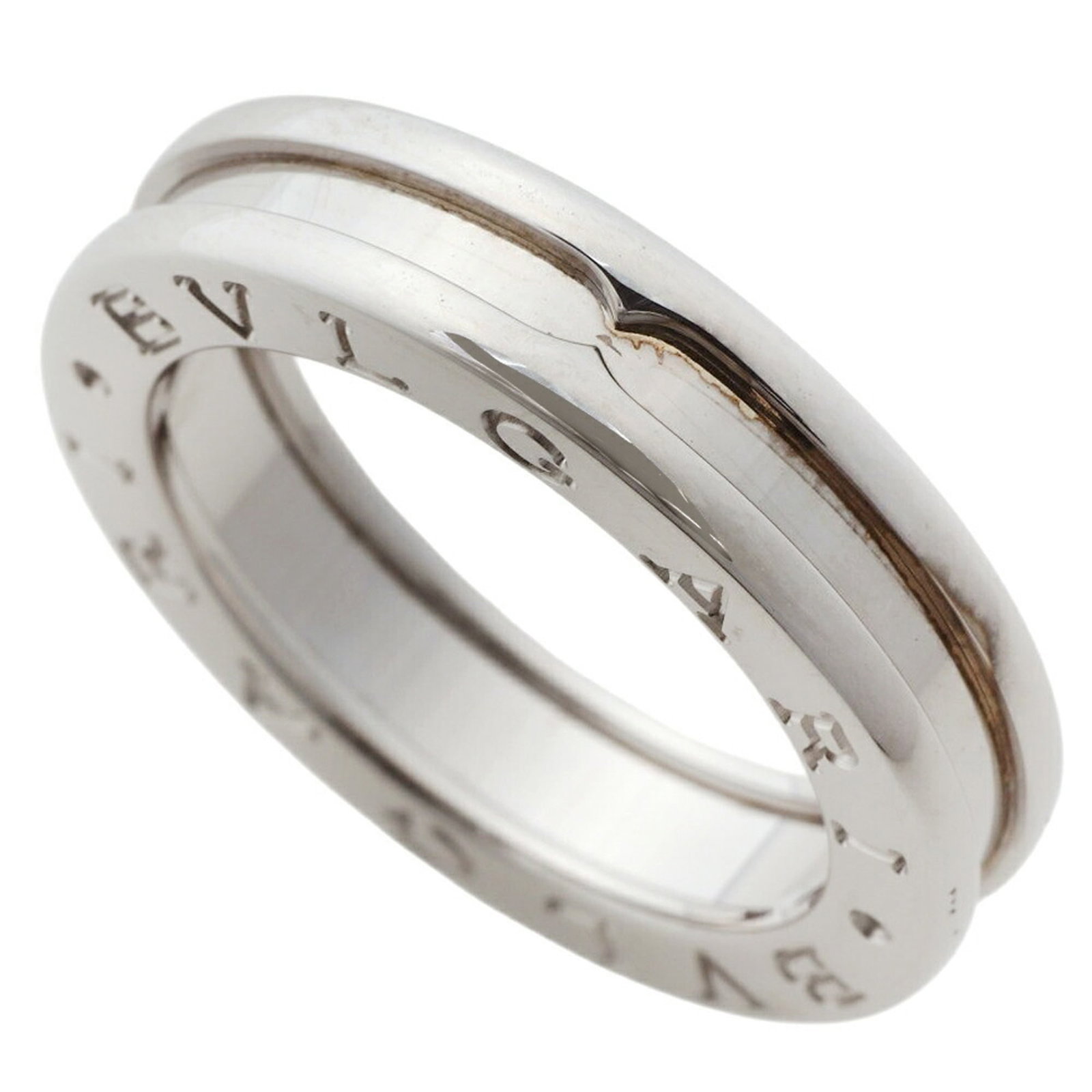 White Gold Bvlgari Ring Band: White Gold Bvlgari Ring Band White gold (18K) band ring from Bvlgari, available in size 6 and US size 51. This elegant ring features a striking white gold design that adds sophistication to any outfit