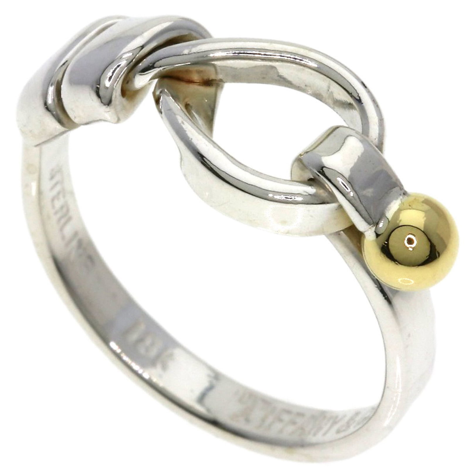 Yellow Gold Silver Tiffany Ring Band: Yellow Gold Silver Tiffany Ring Band Yellow Gold Silver Tiffany Ring Band features a striking combination of 18K yellow gold and silver, creating a unique and eye-catching design. This band ring is cr