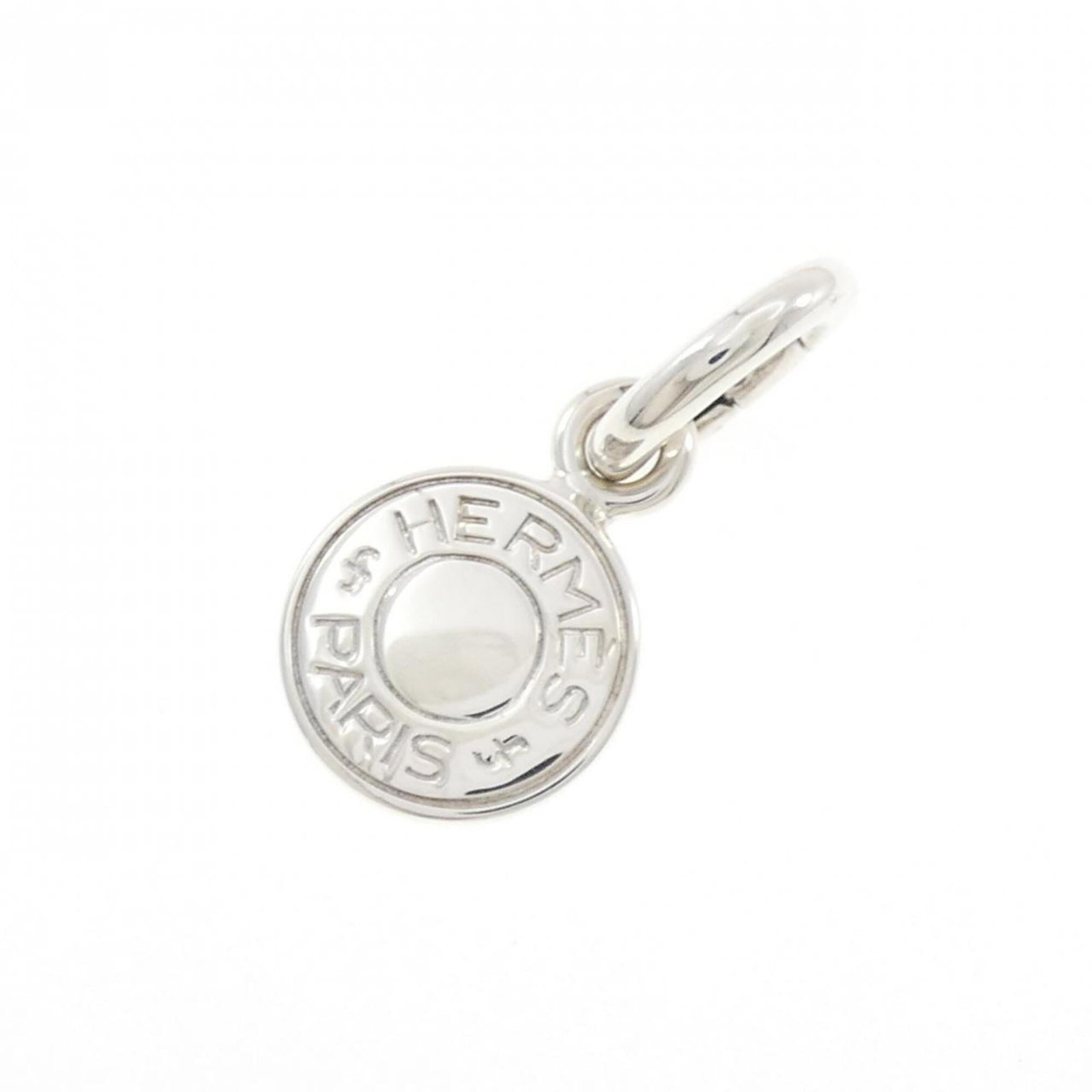 Herms Clou De Selle Pendant: Herms Clou De Selle Pendant The Herms Clou De Selle Pendant is a stunning silver pendant featuring the iconic Herm?s logo, expertly crafted from high-quality 925 silver. With its sleek design and prec