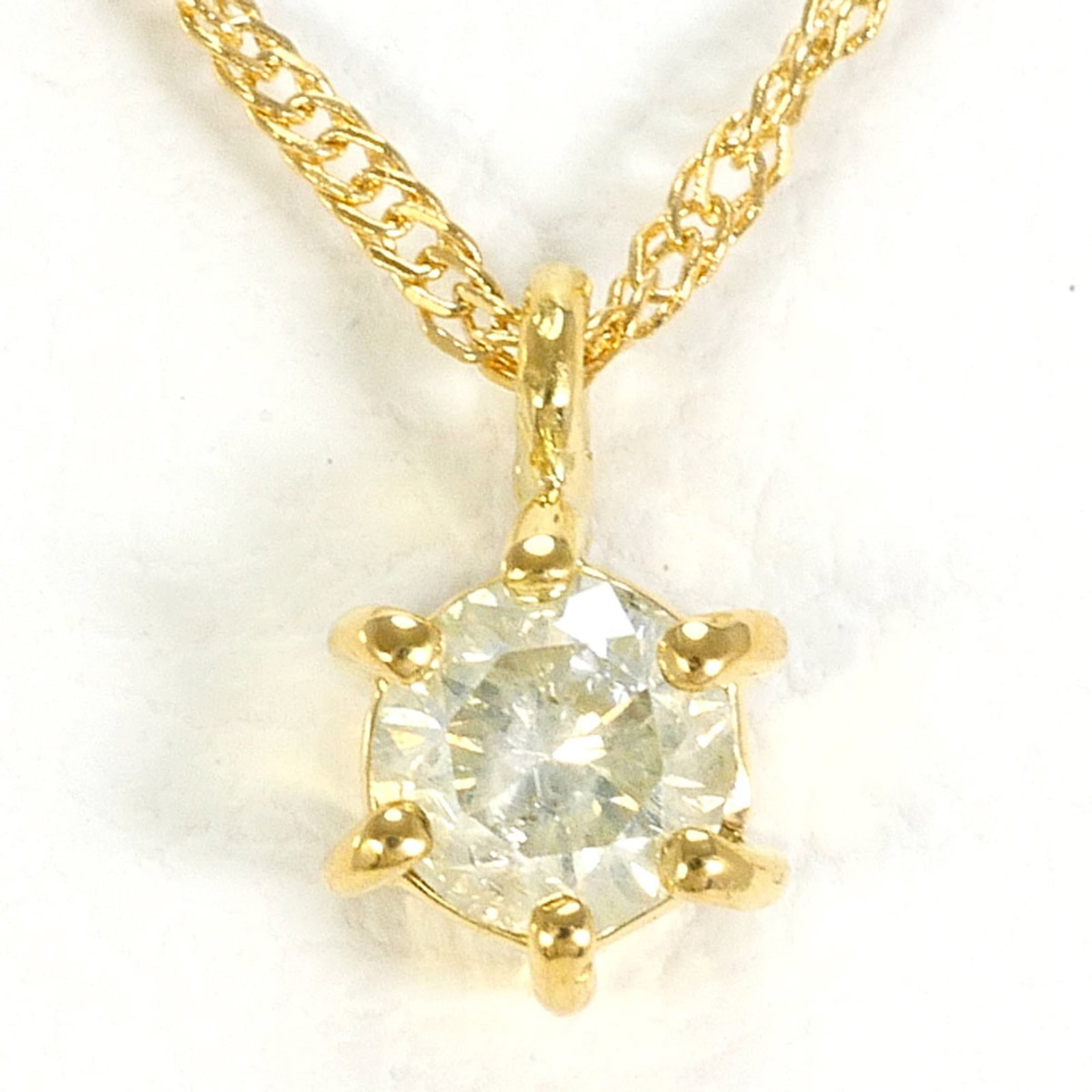 18K (18-Karat) Yellow Gold Necklace With 0.1Ct Diamond Total Weight 1.1G 42Cm Length Jewelry: 18K (18-Karat) Yellow Gold Necklace With 0.1Ct Diamond Total Weight 1.1G 42Cm Length Jewelry 18K yellow gold necklace with a total weight of 1.1g and featuring 0.1ct diamonds, measuring 42cm in length