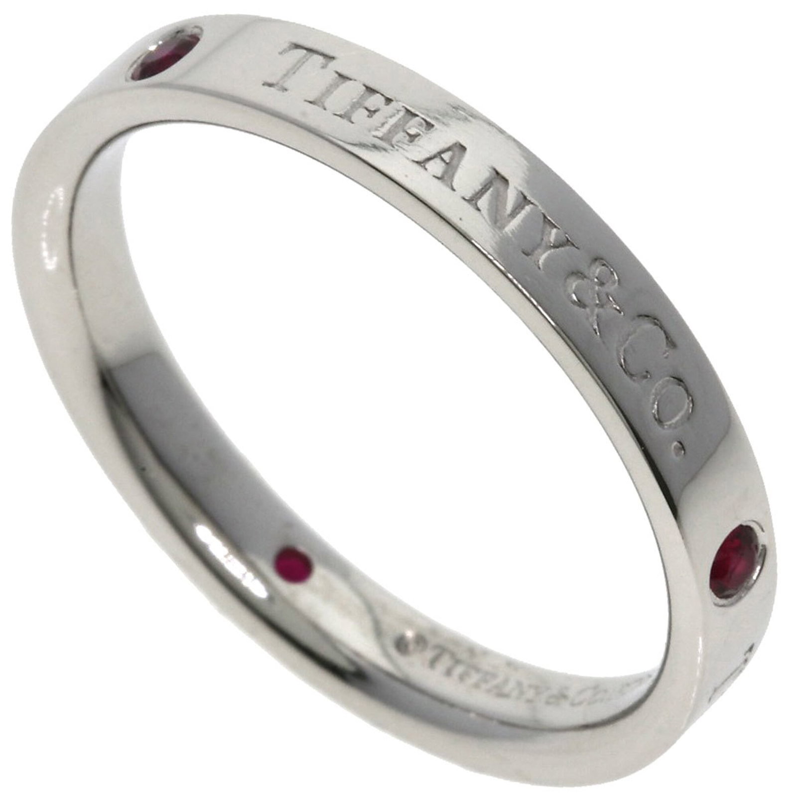 Tiffany Band Ring Platinum 950: Tiffany Band Ring Platinum 950 Platinum 950 Tiffany band ring features a stunning ruby stone, crafted from high-quality platinum. The US size 7.5 design ensures a comfortable fit for women's hands. Th