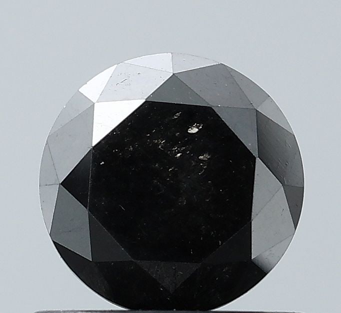 Round 0.94ct Black VVS2 - Loose Natural Diamond: Round 0.94ct Black VVS2 - Loose Natural Diamond 0.94ct Black VVS2 - Loose Natural Diamond for sale, featuring an EX cut and EX polish, with a clarity grade of VVS2 and a color that's as black as the n