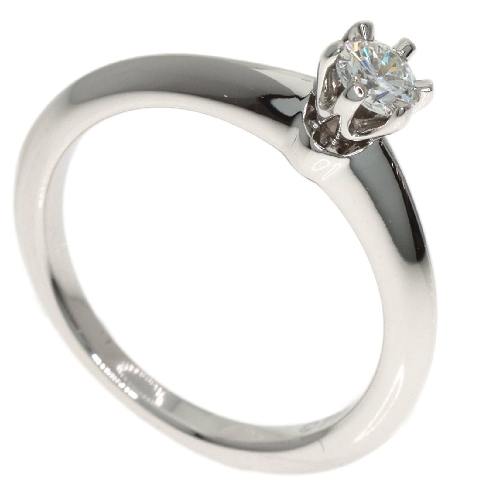 Tiffany Band Ring Platinum 950: Tiffany Band Ring Platinum 950 Platinum band ring with a diamond stone, crafted by Tiffany. This 3.5 US size ring features a width of 1.8mm and weighs 3.8g, making it a delicate yet substantial access