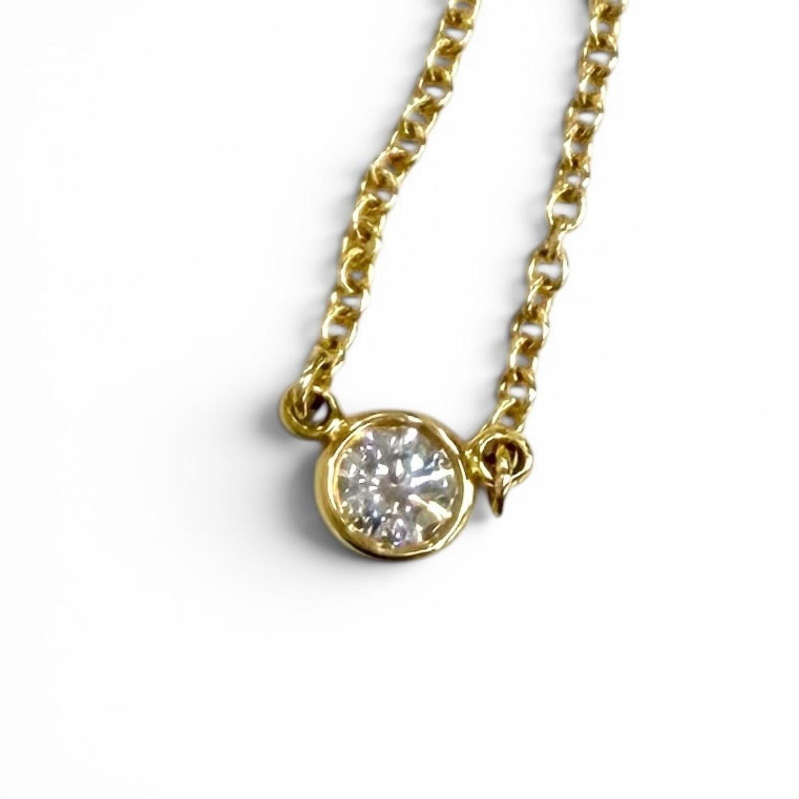 Tiffany&Co. Tiffany & Co. Elsa Peretti By The Yard 1P Diamond Necklace Au750 Diameter Approx.: Tiffany&Co. Tiffany & Co. Elsa Peretti By The Yard 1P Diamond Necklace Au750 Diameter Approx. Tiffany & Co.'s Elsa Peretti-designed diamond necklace boasts a striking 18K yellow gold pendant with a di