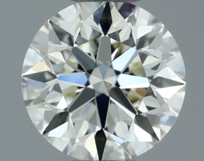 GIA Round 0.4ct L VVS2 - Loose Natural Diamond: GIA Round 0.4ct L VVS2 - Loose Natural Diamond GIA-certified, this loose natural diamond boasts exceptional clarity with its VVS2 grade and excellent cut symmetry. Measuring 4.71 x 4.69 x 2.96mm, the