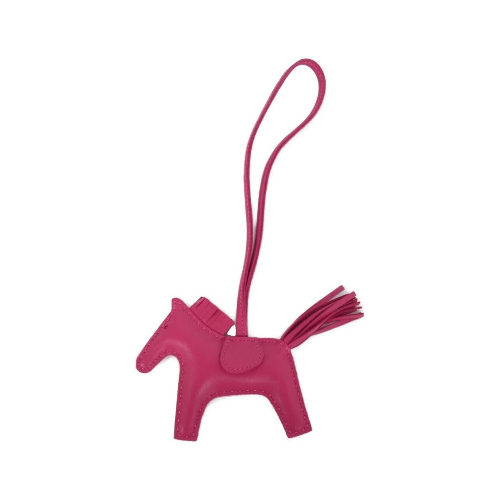Hermes Charm Handbag Agneau Milo: Hermes Charm Handbag Agneau Milo Agneau Milo, the signature material from Herm?s, gives this charm handbag its unique texture and appearance. The pink color adds a touch of femininity to this stylish 