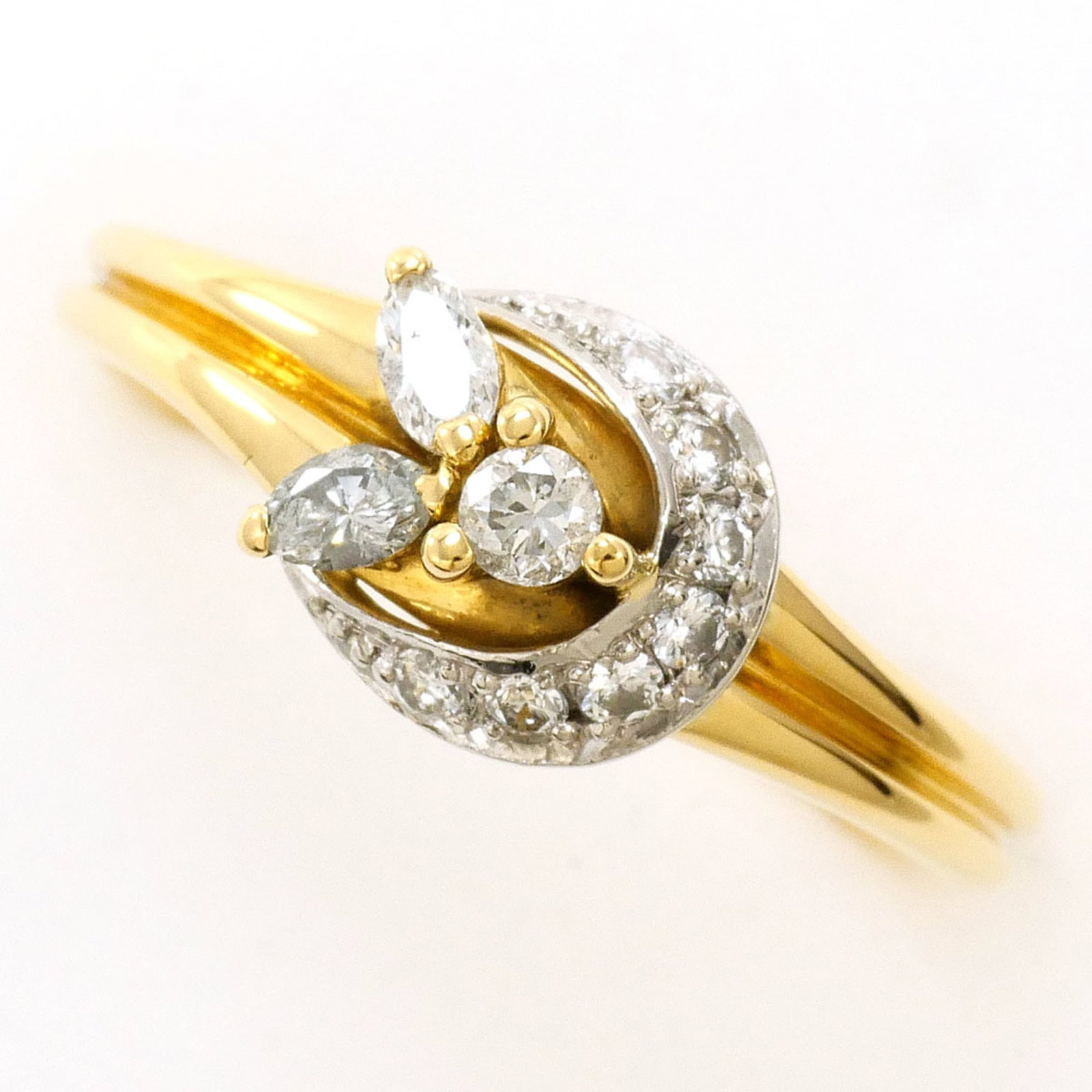 Unbranded Platinum Gold 18K Yellow Ring Band: Unbranded Platinum Gold 18K Yellow Ring Band Platinum and yellow gold combine in this elegant 18K ring band, featuring a diamond weighing 0.21 carats. The ring's platinum core provides durability, whi