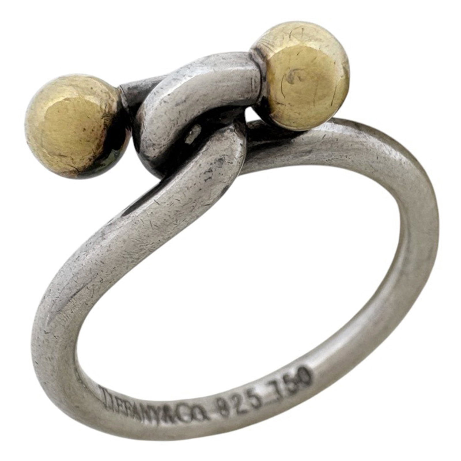 Tiffany Band Ring Gold (18K) Silver 925: Tiffany Band Ring Gold (18K) Silver 925 Tiffany Band Ring Gold (18K) Silver 925 - A timeless and elegant band ring featuring 18K gold and sterling silver, available in a US size 5.5. This beautiful pi