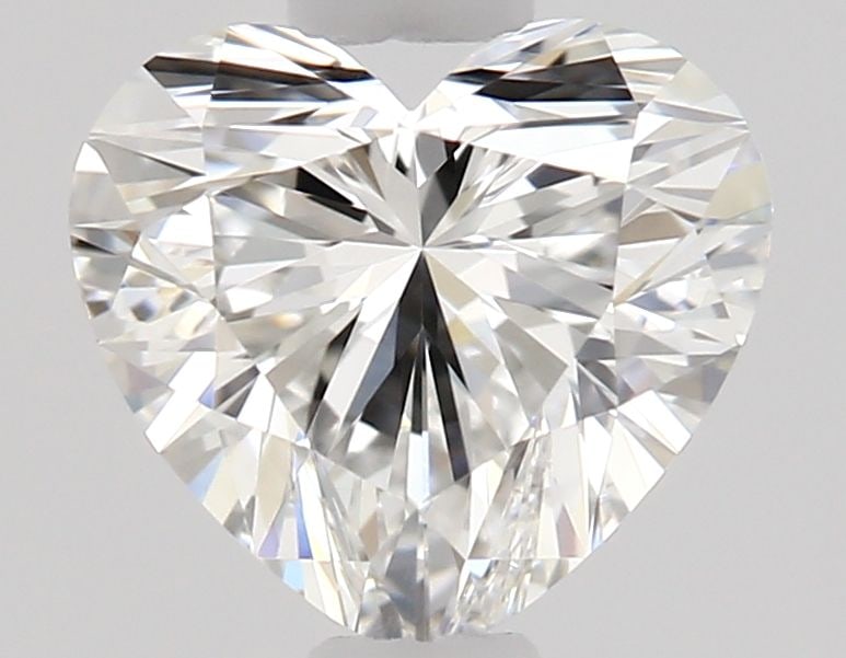 GIA Heart 0.54ct E VVS1 - Loose Natural Diamond: GIA Heart 0.54ct E VVS1 - Loose Natural Diamond GIA certified, this natural diamond boasts exceptional clarity with a VVS1 grade and vibrant color. Its EX polish and symmetry showcase its exceptional 