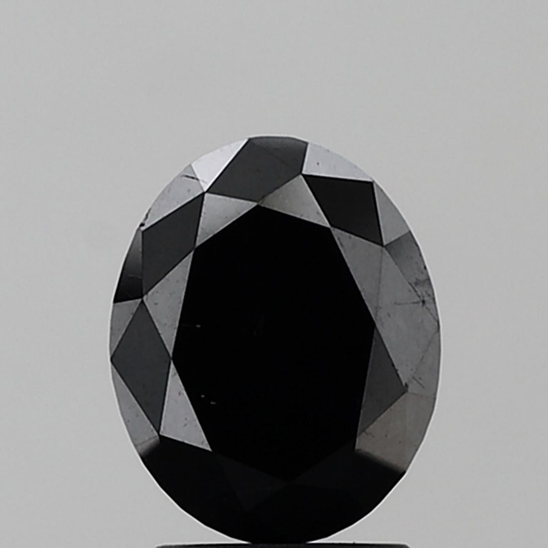 Oval 3.31ct Black VVS2 - Loose Natural Diamond: Oval 3.31ct Black VVS2 - Loose Natural Diamond Oval cut diamond with exceptional clarity and polish, boasting a striking black color. Measuring 9.44L x 7.64W x 5.1H, this natural Fancy stone shines wi