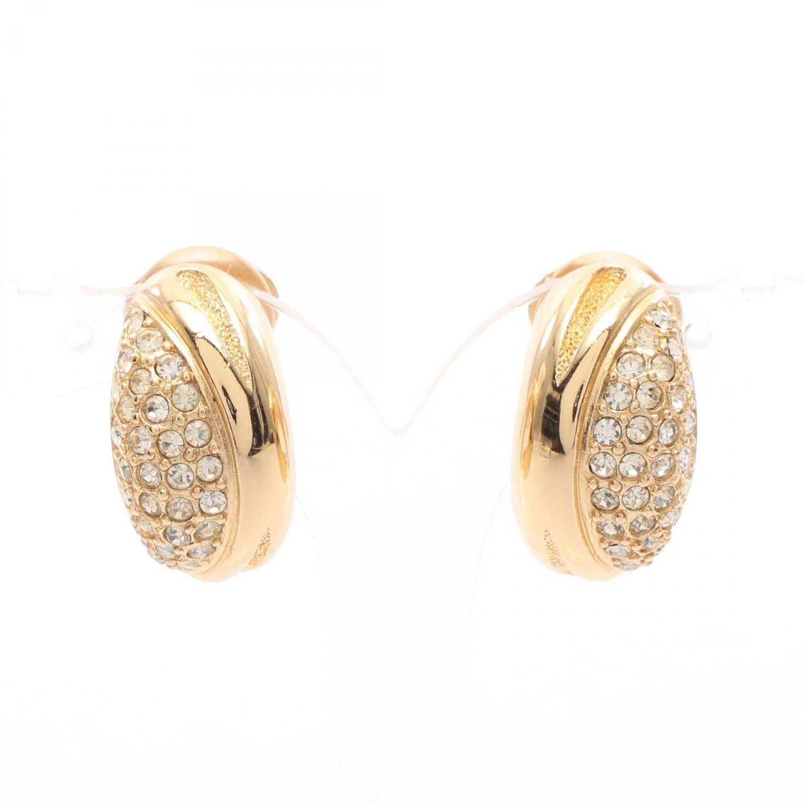Christian Dior Clip Earrings Rhinestone Gold Plating: Christian Dior Clip Earrings Rhinestone Gold Plating Clip earrings from Christian Dior feature clear and gold rhinestone details in gold plating. The earrings measure 24.00mm x 15.00mm / 0.94'' x 0.59