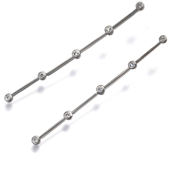 Diamond 0.18Ct/ 0.18Ct 5P Drop Earrings 18K 750 White Gold/ 14K 585 White Gold: Diamond 0.18Ct/ 0.18Ct 5P Drop Earrings 18K 750 White Gold/ 14K 585 White Gold Drop earrings featuring two natural diamonds totaling 0.18ct, set in 18k and 14k white gold. The elegant design