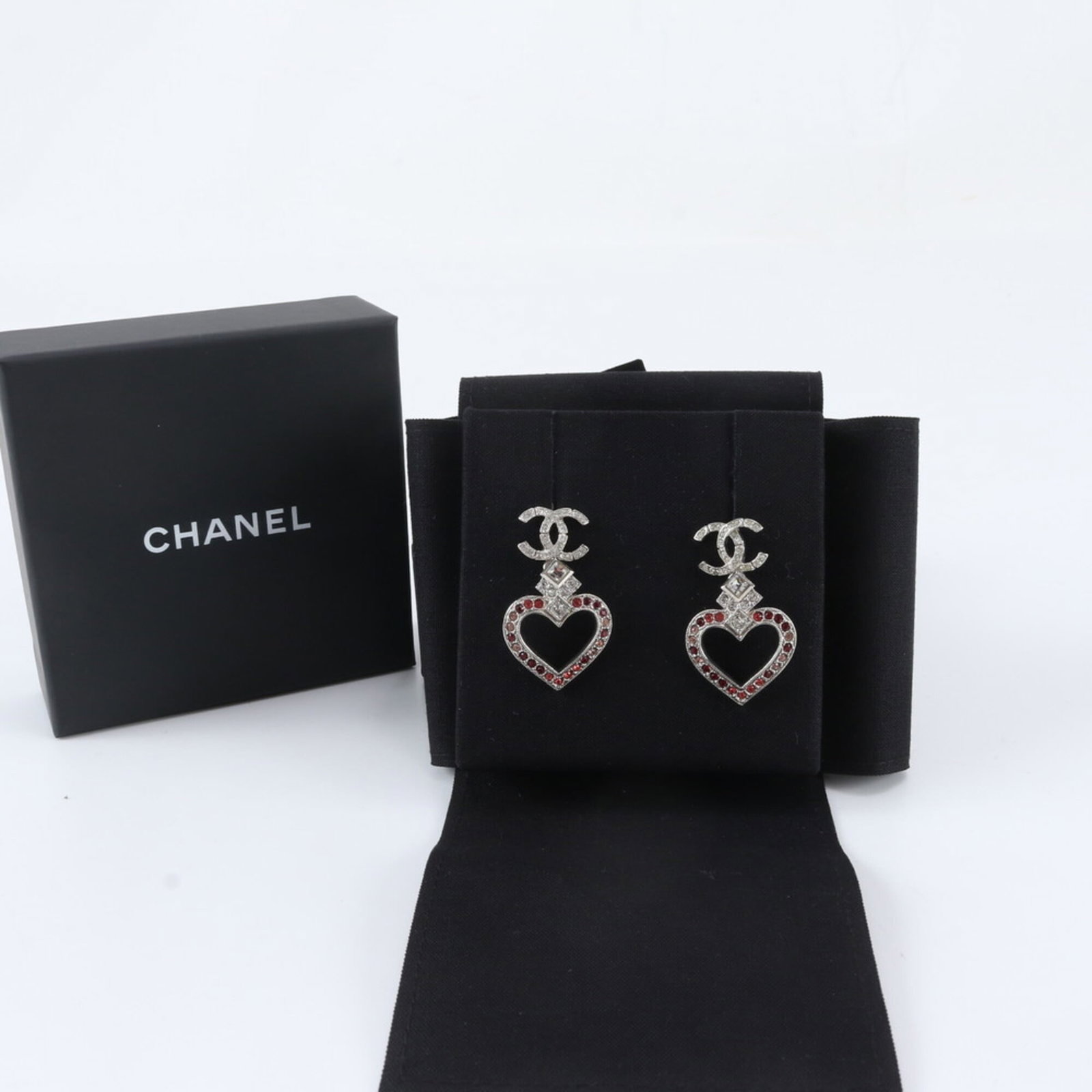 Chanel A16 K 2016 Production Coco Mark Heart Earrings Silver Rhinestone Accessory For Women: Chanel A16 K 2016 Production Coco Mark Heart Earrings Silver Rhinestone Accessory For Women Silver rhinestone earrings from Chanel's A16 K collection, produced in France. Featuring a striking heart de