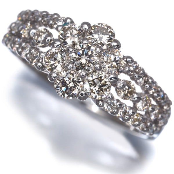Light Brown Diamond 1.00Ct Paved Ring 900 Platinum: Light Brown Diamond 1.00Ct Paved Ring 900 Platinum 900 Platinum pave ring features a natural light brown diamond weighing 1.00ct, set in a sturdy platinum band with a comfortable US6-6.25 size and 8.5