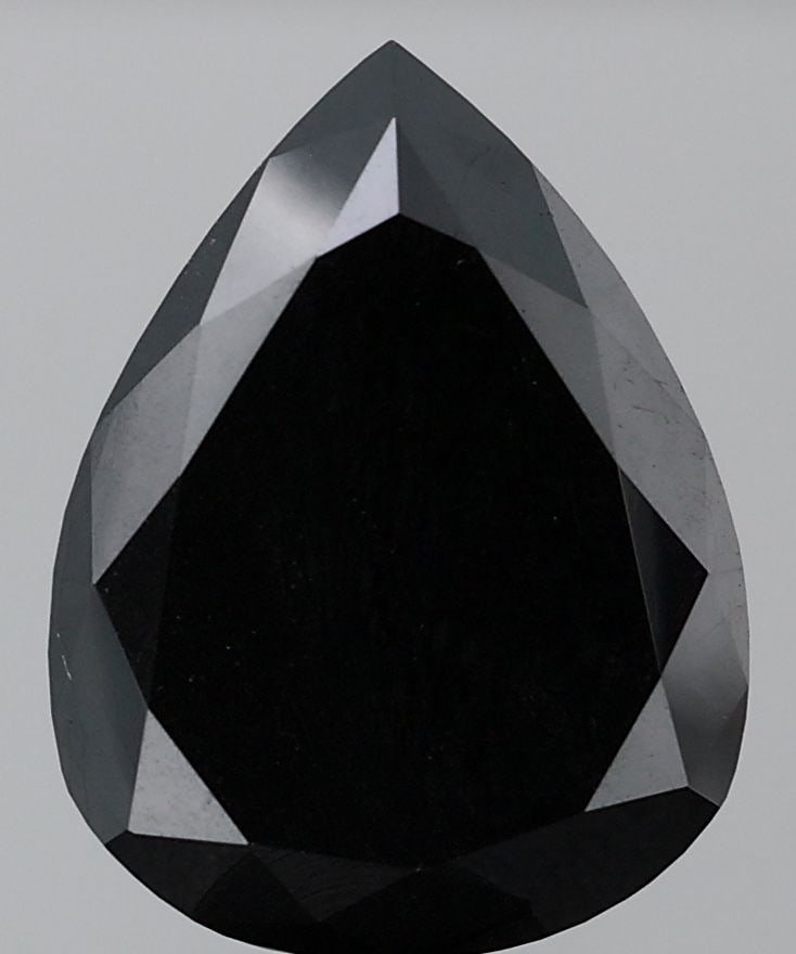 Pear 6.67ct Fancy Black VVS2 - Loose Natural Diamond: Pear 6.67ct Fancy Black VVS2 - Loose Natural Diamond The 6.67ct Fancy Black VVS2 diamond boasts exceptional clarity and polish, with its EX symmetry showcasing its precise cut. This natural loose diam