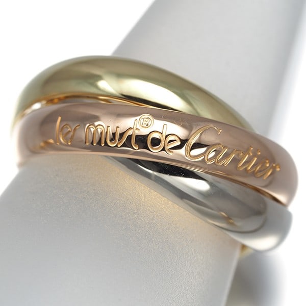 Cartier Ring Trinity 3Color Classic Eu49 18K 750 Yellow White Rose Gold: Cartier Ring Trinity 3Color Classic Eu49 18K 750 Yellow White Rose Gold Cartier's iconic Trinity ring boasts a sleek, multi-tone design featuring 18k yellow, white, and rose gold. The classic Eu49 sty
