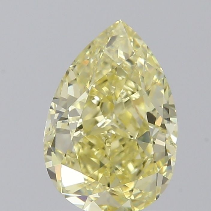 GIA Pear 0.7ct Fancy Yellow VVS2 - Loose Natural Diamond: GIA Pear 0.7ct Fancy Yellow VVS2 - Loose Natural Diamond GIA-certified Fancy Yellow diamond with exceptional clarity and polish, boasting an EX grade. This loose natural stone measures 6.94 x 4.72 x 3
