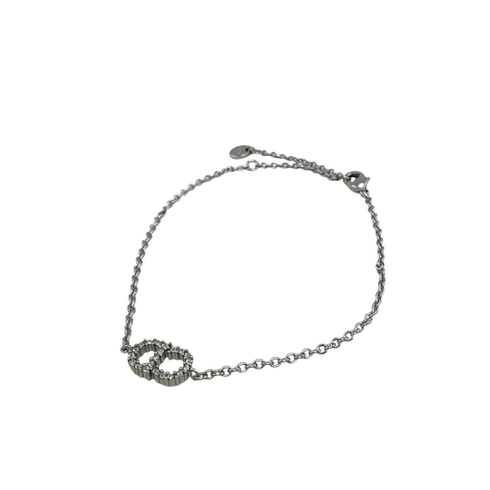 Dior Charm Metal Bracelet Christian: Dior Charm Metal Bracelet Christian Silver Charm Metal Bracelet from Christian Dior, featuring a classic charm design, measures 22.5cm in length. This elegant bracelet showcases the signature style of