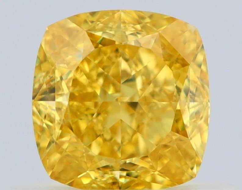 GIA Cushion Brilliant 0.62ct Fancy Vivid Yellow VVS1 - Loose Natural Diamond: GIA Cushion Brilliant 0.62ct Fancy Vivid Yellow VVS1 - Loose Natural Diamond GIA certified, 0.62ct Fancy Vivid Yellow VVS1 diamond boasts exceptional color and clarity, with EX polish and VG symmetry.