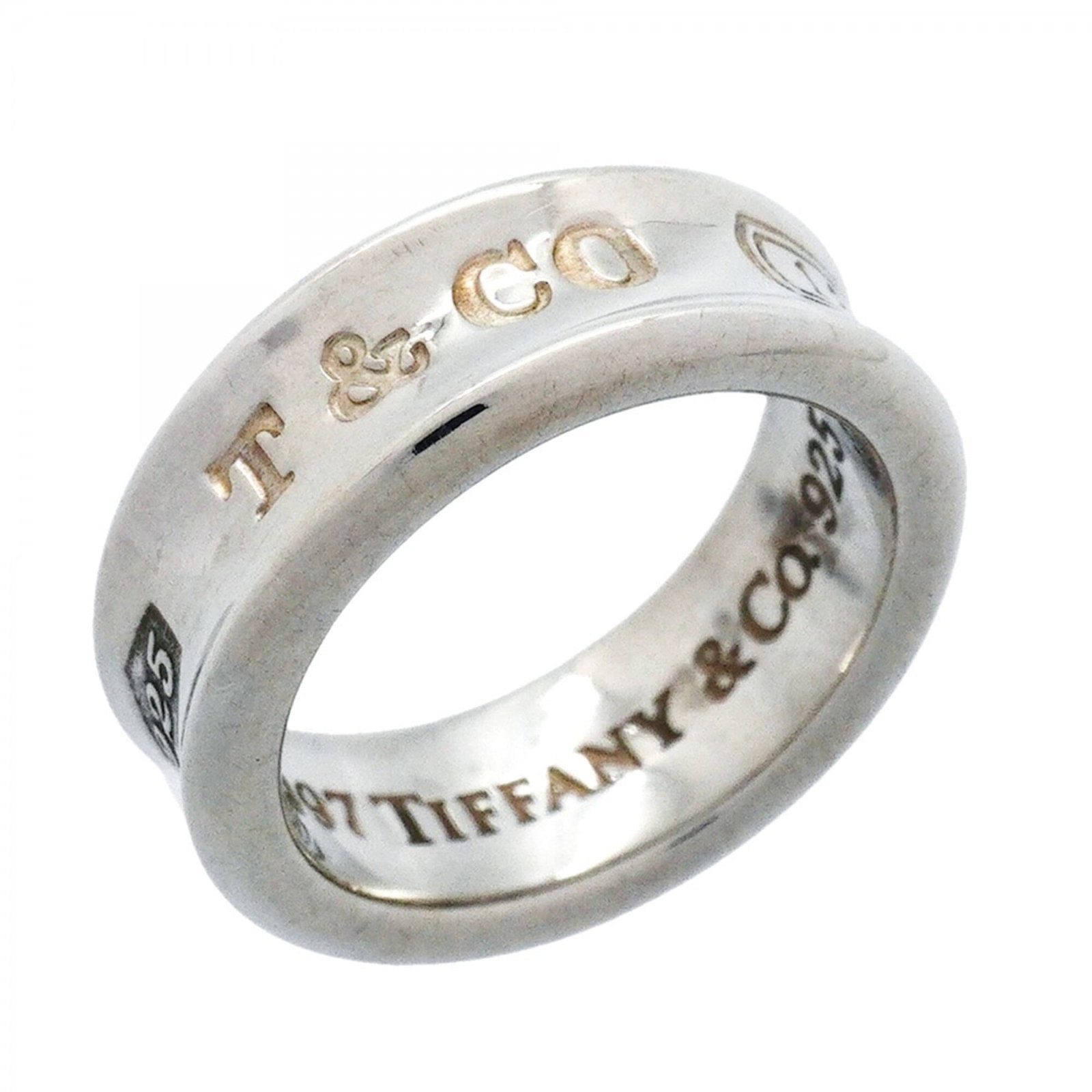Silver band ring Tiffany 925: Silver band ring Tiffany 925 Silver band ring from Tiffany Type, made from high-quality silver 925. This women's band ring features a sleek design and is available in US size 4. Item Specifics: Brand:
